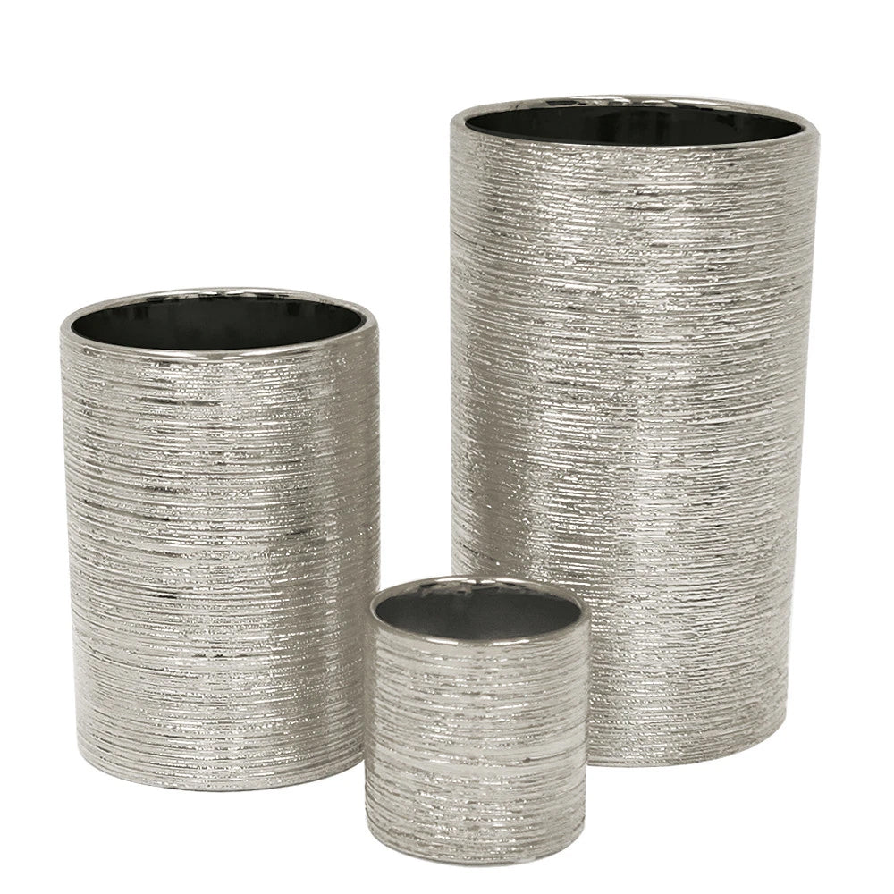 Etched Metallic Silver Cylinders